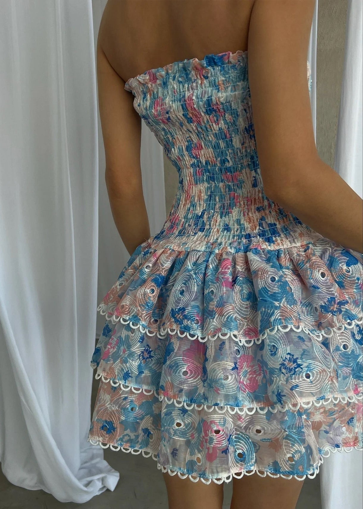Kaye | Women’s strapless floral dress with shirred bodice and flowing silhouette