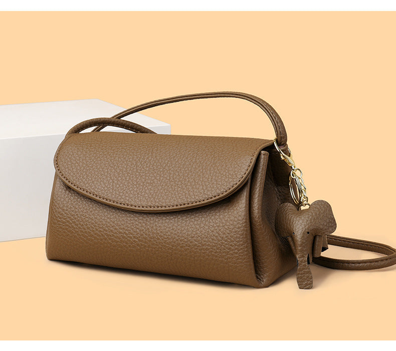 Chloe | Women’s crossbody bag with flap closure and playful detail