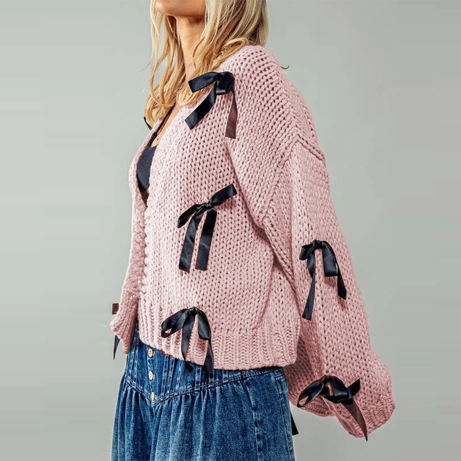 Belle | Women’s chunky cable knit cardigan with bow trim accents