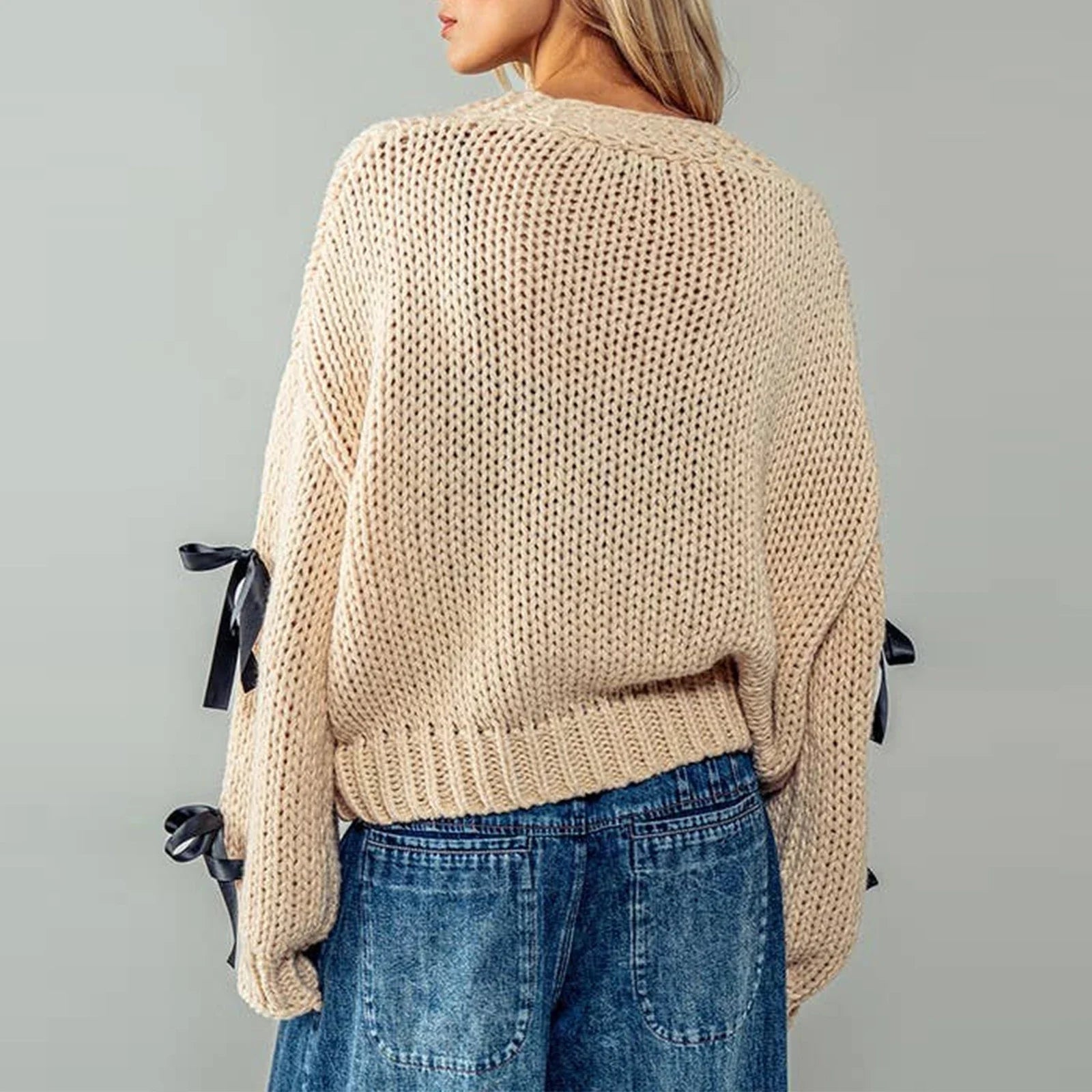 Belle | Women’s chunky cable knit cardigan with bow trim accents
