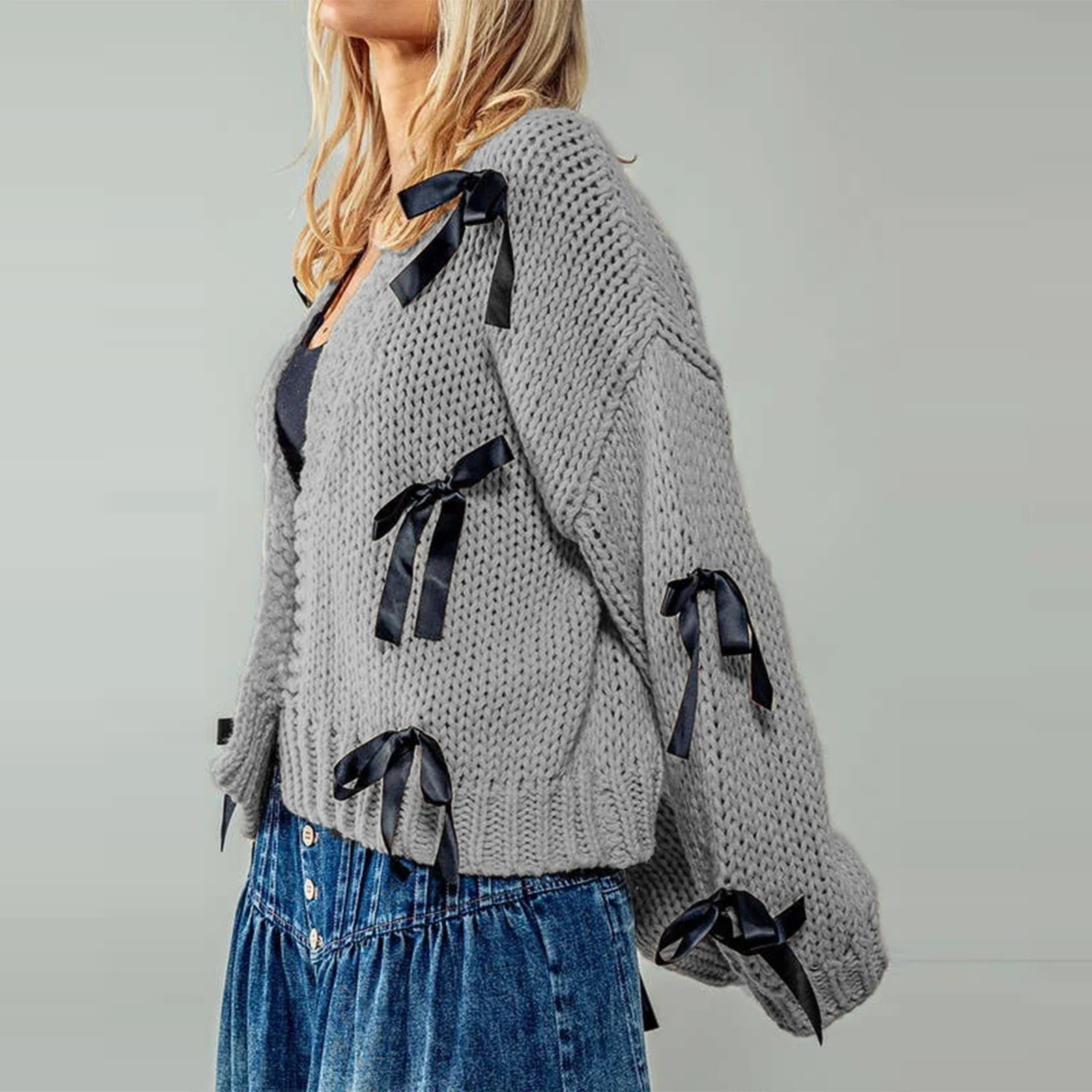 Belle | Women’s chunky cable knit cardigan with bow trim accents