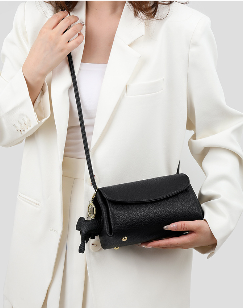 Chloe | Women’s crossbody bag with flap closure and playful detail