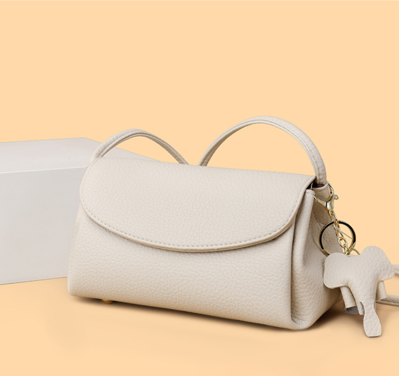 Chloe | Women’s crossbody bag with flap closure and playful detail