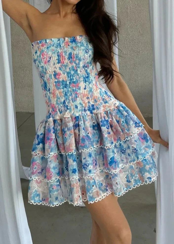 Kaye | Women’s strapless floral dress with shirred bodice and flowing silhouette