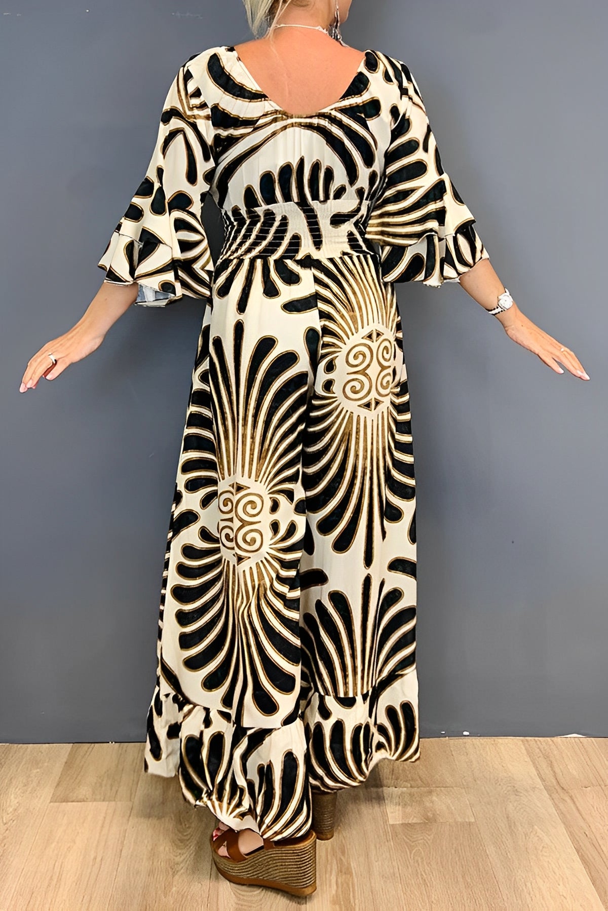 Charm | Women’s floral jumpsuit with flounce sleeves and fitted waist