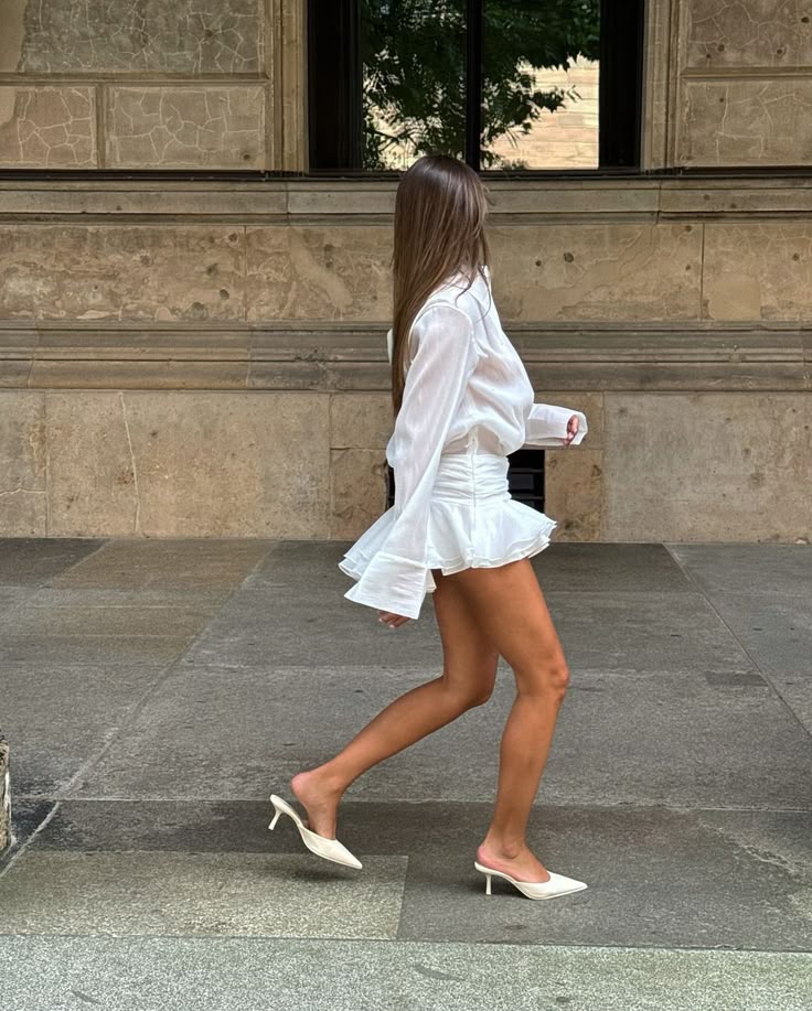 Leni | Women’s pleated mini dress with structured silhouette