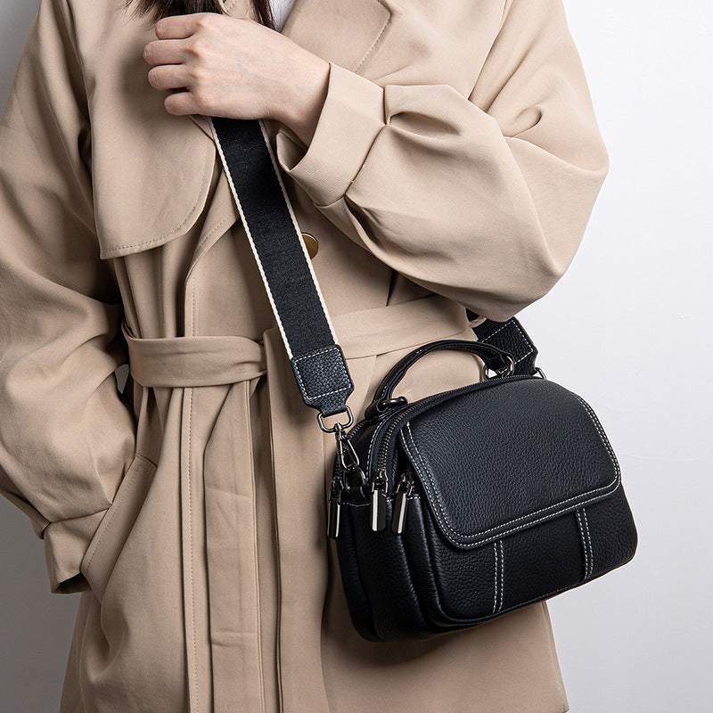 Luna | Women’s round handbag with zipper closure and dual straps