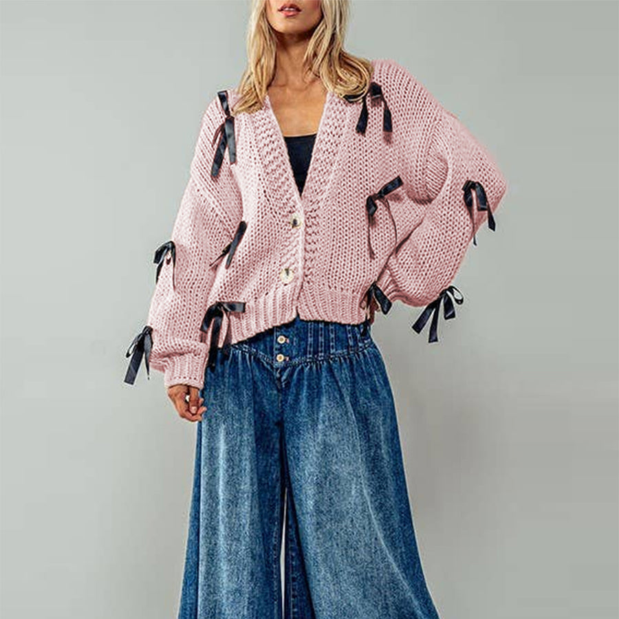 Belle | Women’s chunky cable knit cardigan with bow trim accents