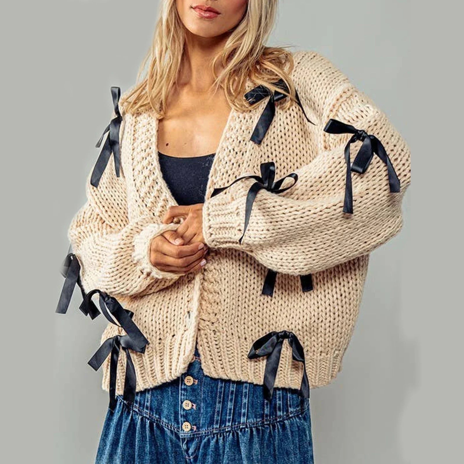 Belle | Women’s chunky cable knit cardigan with bow trim accents